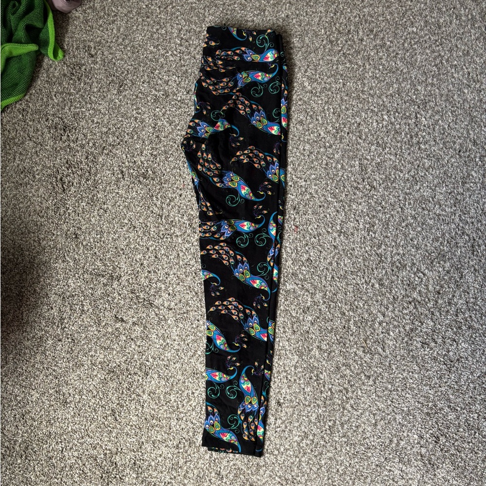 LulaRoe leggings 
one size 
never worn 
Multi Colored